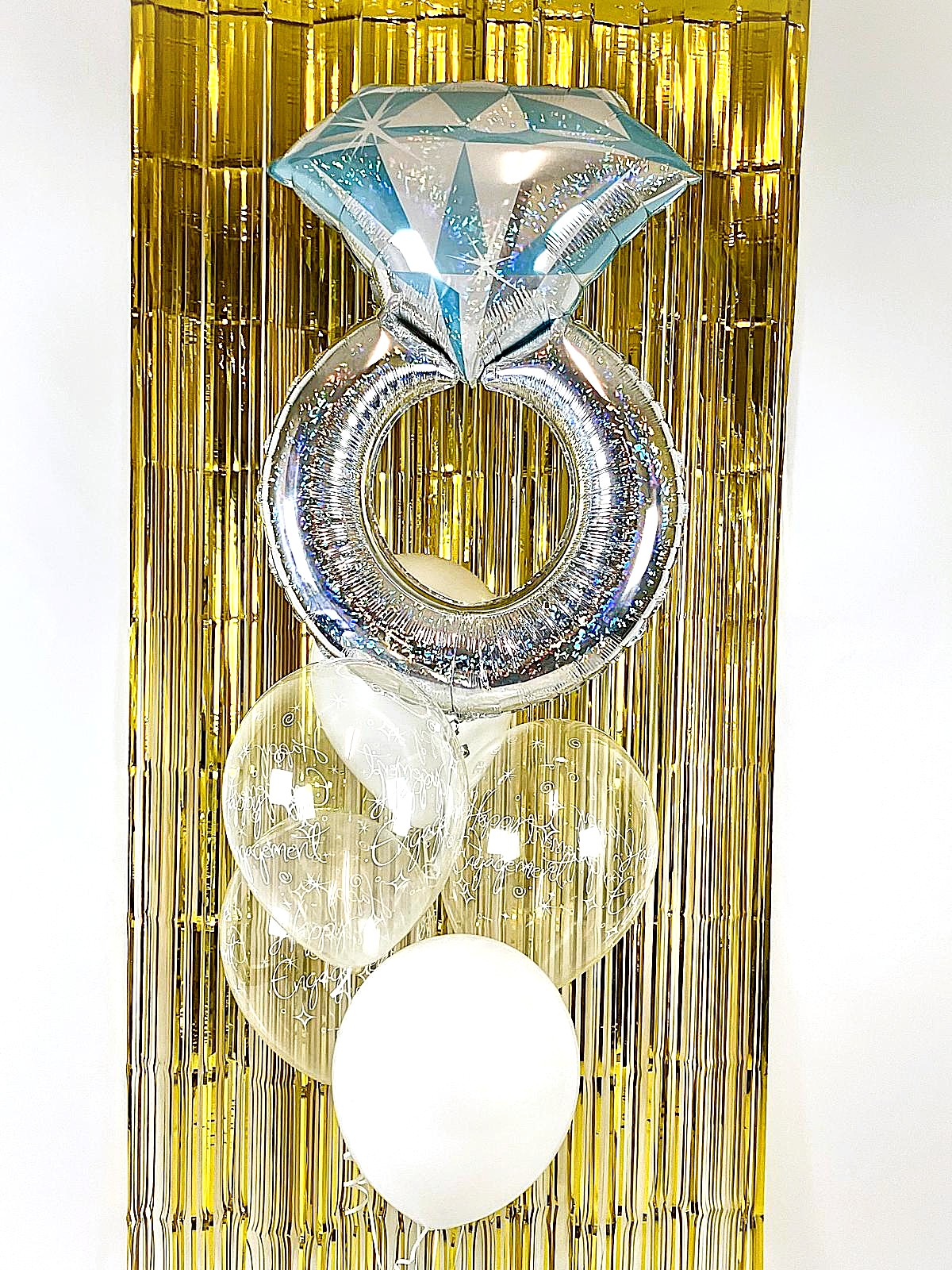 The engagement ring.